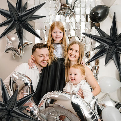 60-Piece Black Balloon Set with 12 Foil Starburst Balloons